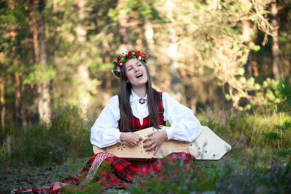 What are the best opportunities for tourists to learn traditional Welsh harp playing in Cardiff?